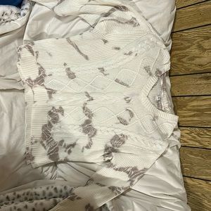 Sweater the spots are more lavender off camera